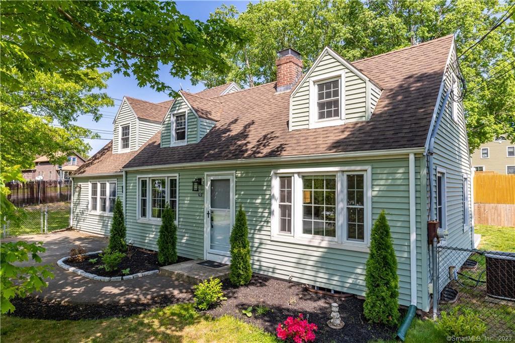 10 Vista Road North Haven, CT 06473 - Photo 1 of 1 a front view of a house with garden