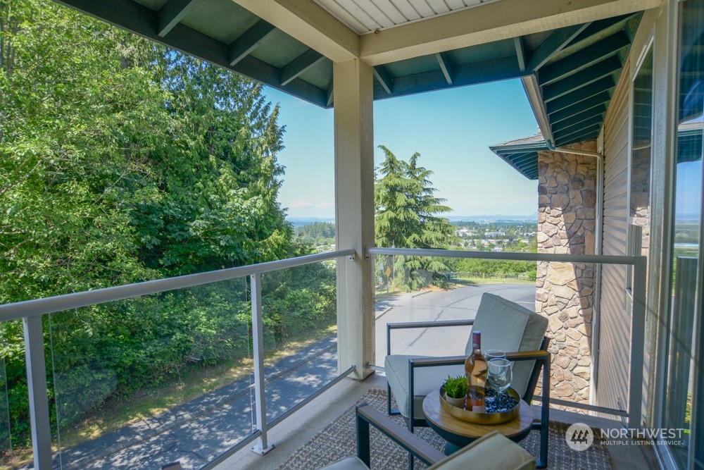 1419 Digby Place, Unit 309 Mount Vernon, WA 98274 - Photo 13 of 34 a view of a balcony with chairs