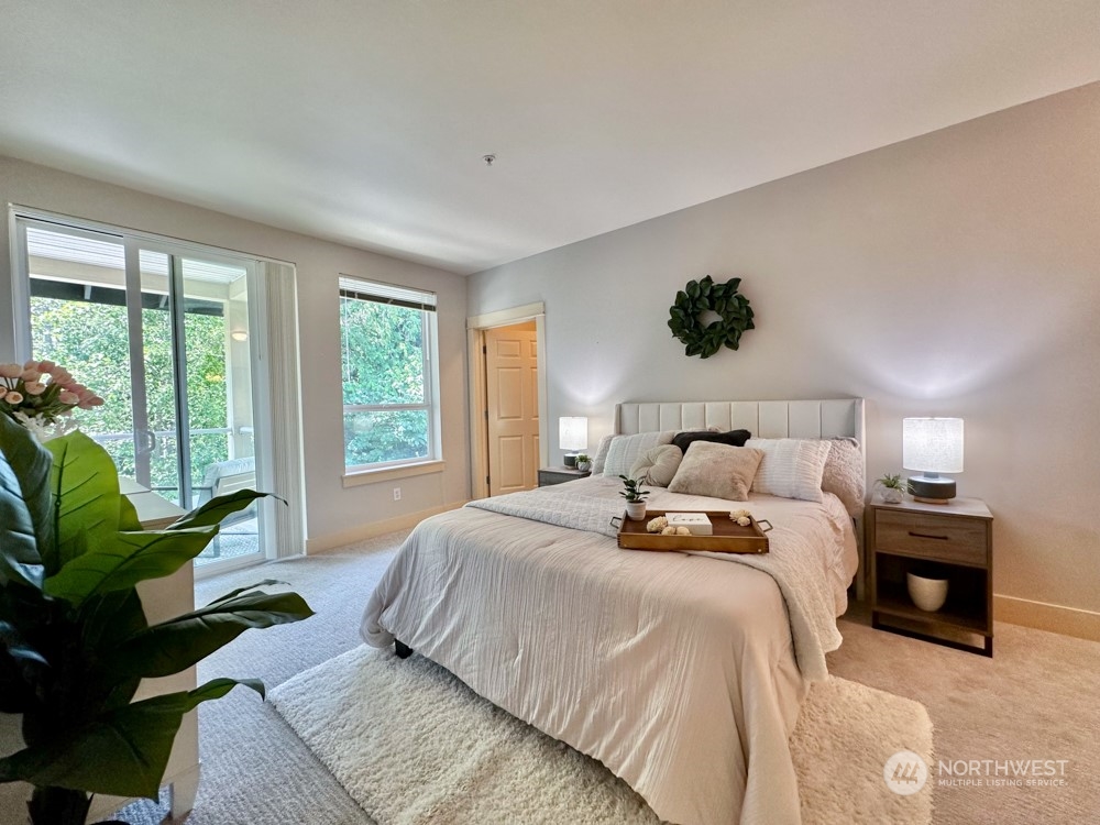 1419 Digby Place, Unit 309 Mount Vernon, WA 98274 - Photo 16 of 34 a bedroom with a bed and a couch