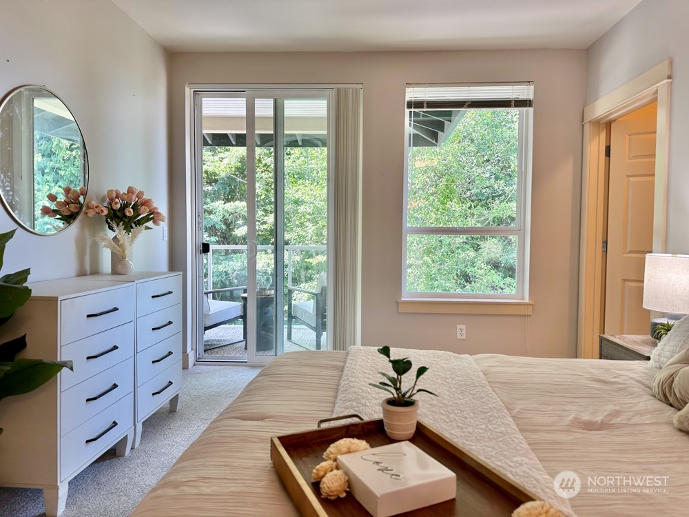 1419 Digby Place, Unit 309 Mount Vernon, WA 98274 - Photo 17 of 34 a bedroom with a bed and a dresser in it