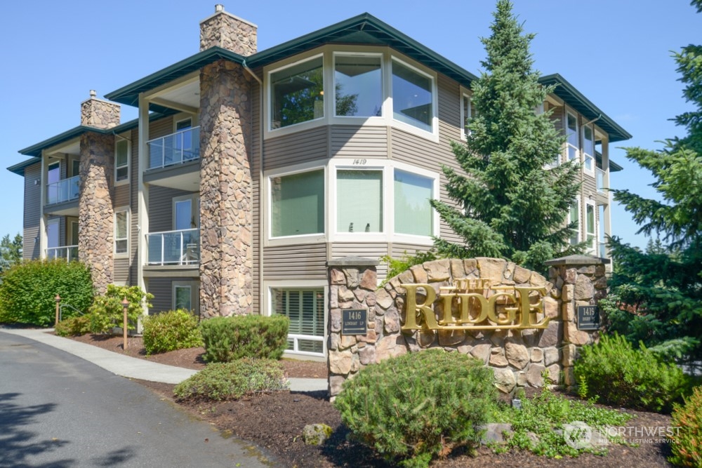1419 Digby Place, Unit 309 Mount Vernon, WA 98274 - Photo 34 of 34 front view of a house with a small yard