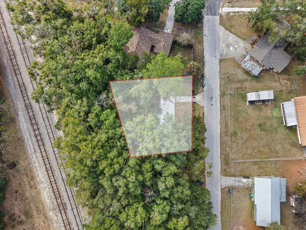 1315 Southwest 252nd Street Newberry, FL 32669 - Photo 27 of 29 an aerial view of a house with a yard basket ball court and outdoor seating
