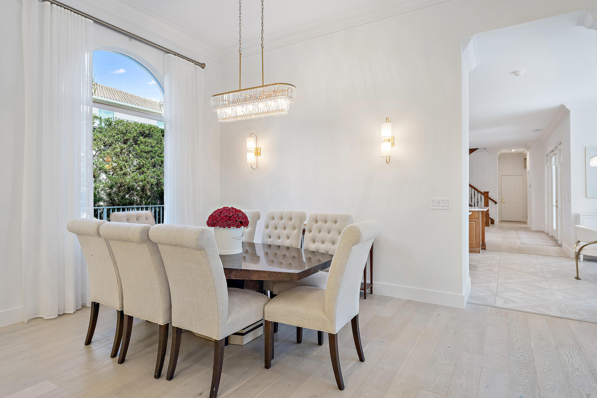 325 Eagle Drive Jupiter, FL 33477 - Photo 11 of 48 a view of a dining room with furniture and window