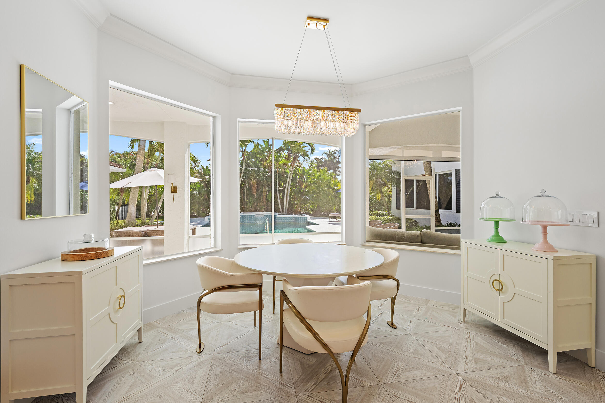 325 Eagle Drive Jupiter, FL 33477 - Photo 13 of 48 a dining room with furniture and window