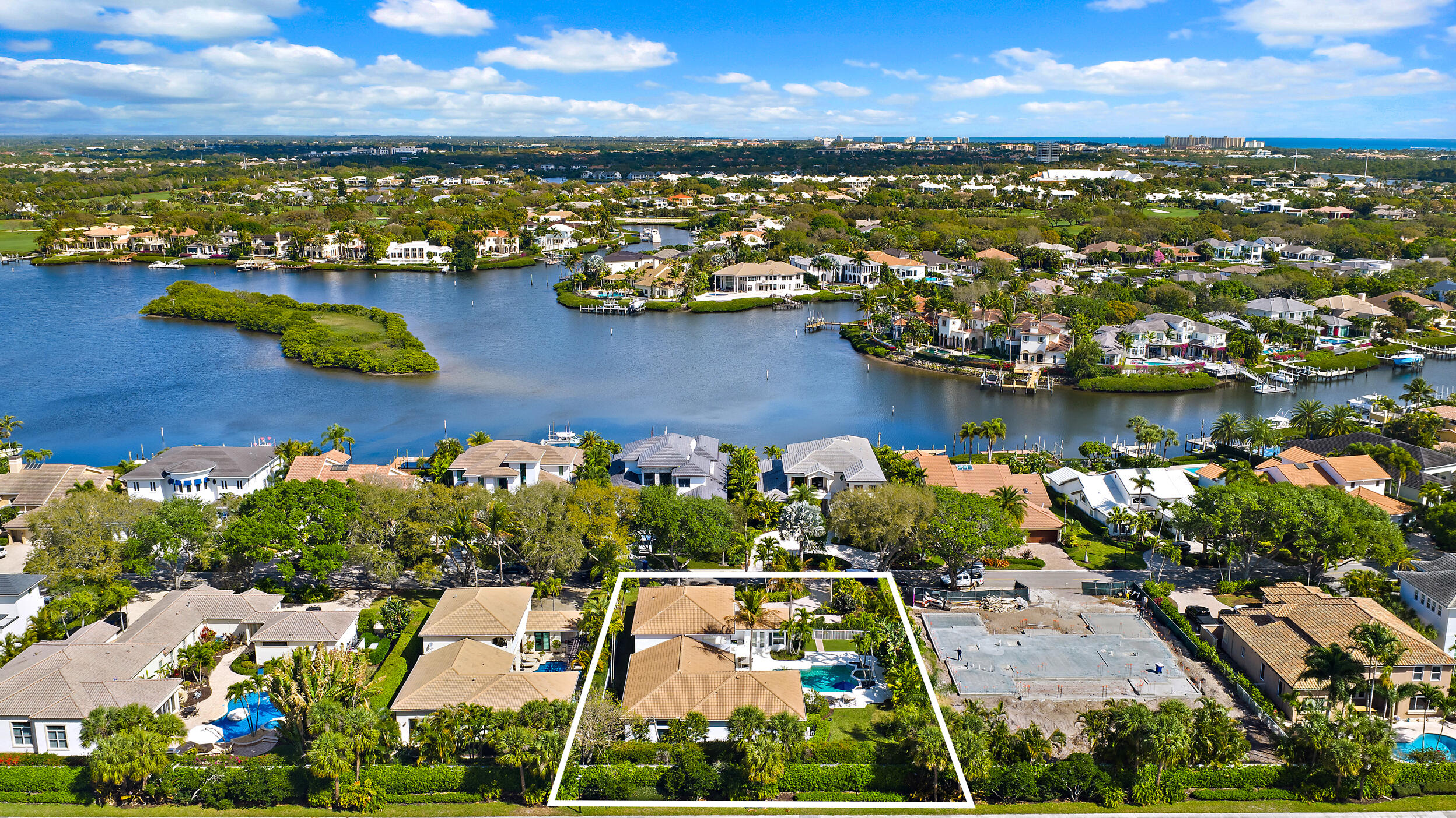 325 Eagle Drive Jupiter, FL 33477 - Photo 6 of 48 a view of a city with an ocean boats