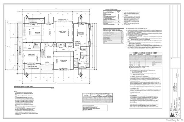 a black and white photo of a living room