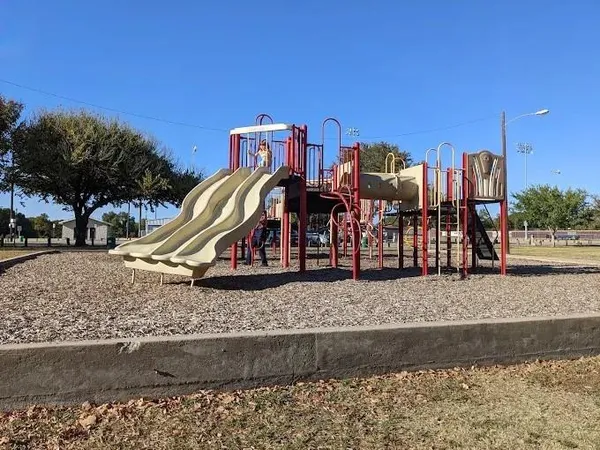 a view of a park with swings