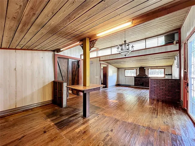 a view of livingroom with furniture wooden floor and window