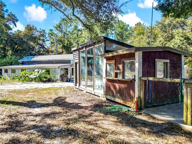 a house view with a outdoor space