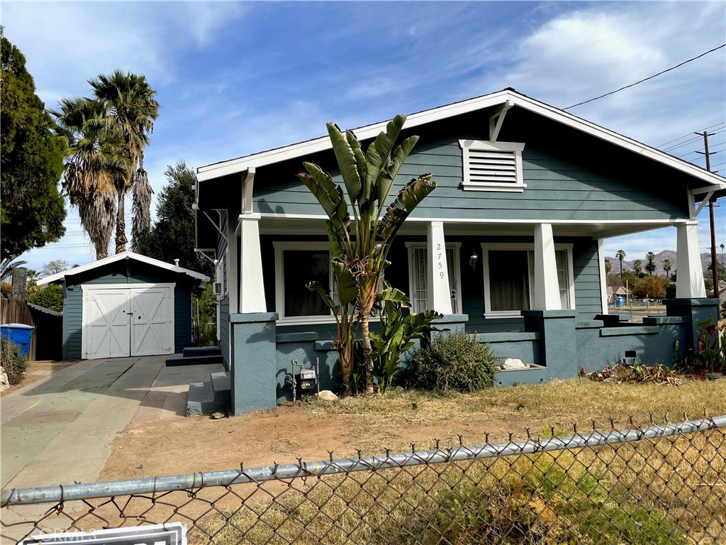 2759 11th Street Riverside, CA 92507 - Photo 1 of 1 a front view of a house with garden