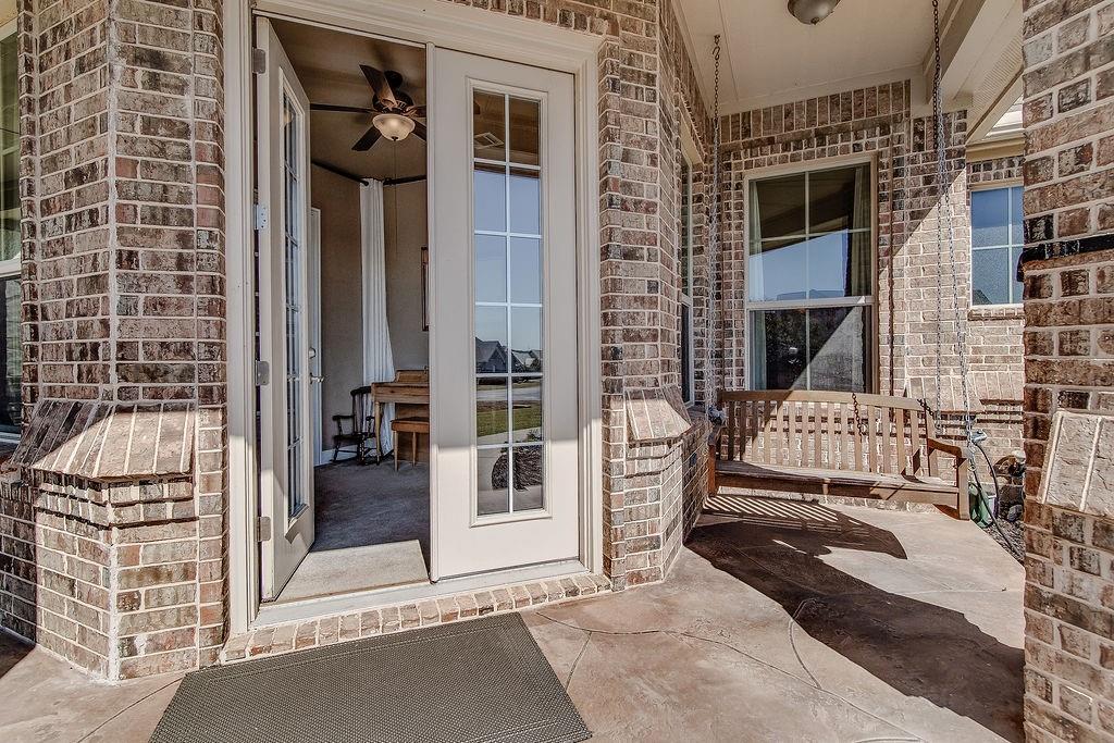 117 Citation Drive Cresson, TX 76035 - Photo 29 of 40 Property entrance featuring a patio area