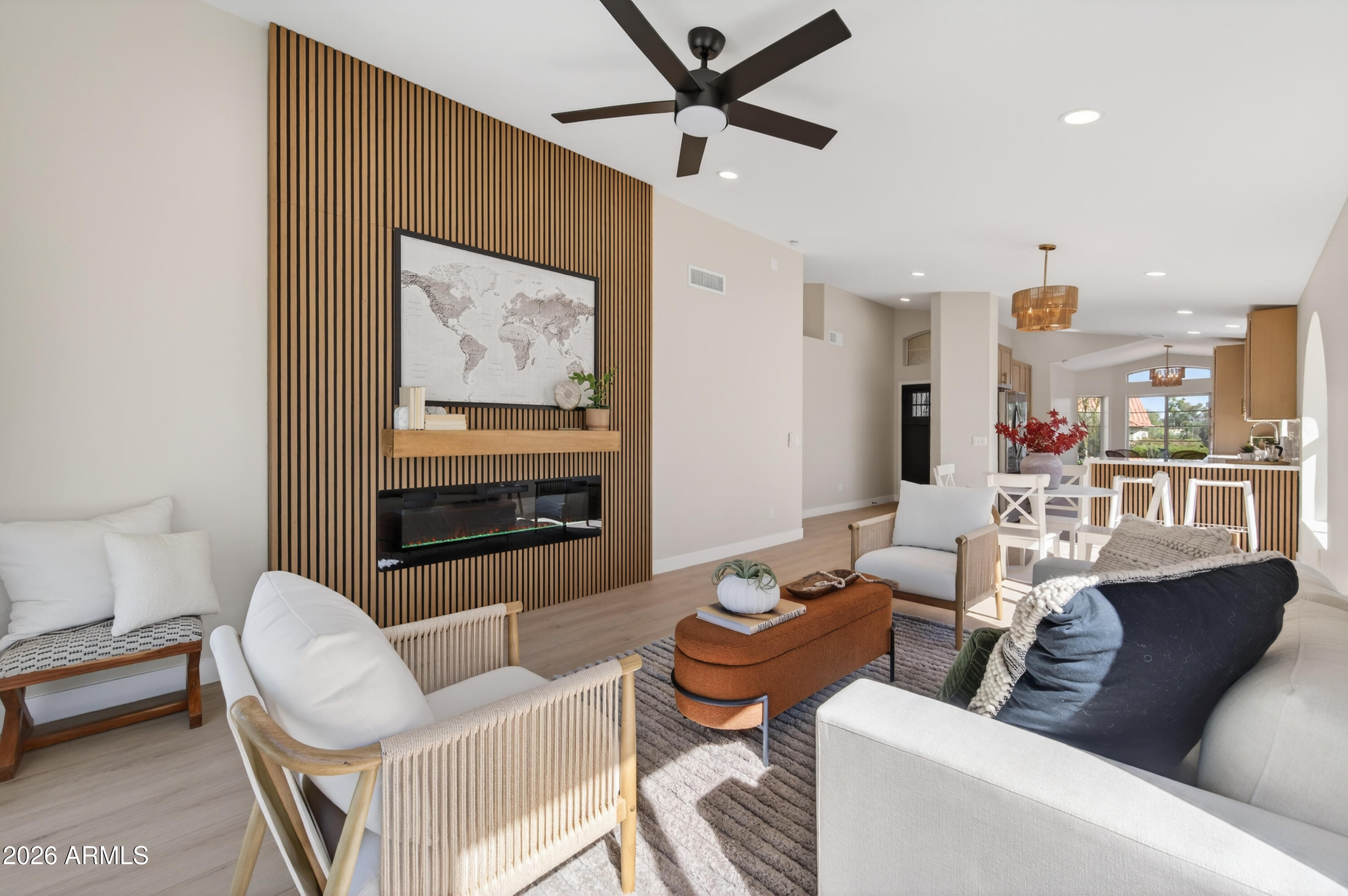 4814 East Monte Way Phoenix, AZ 85044 - Photo 10 of 42 a living room with furniture and a fireplace