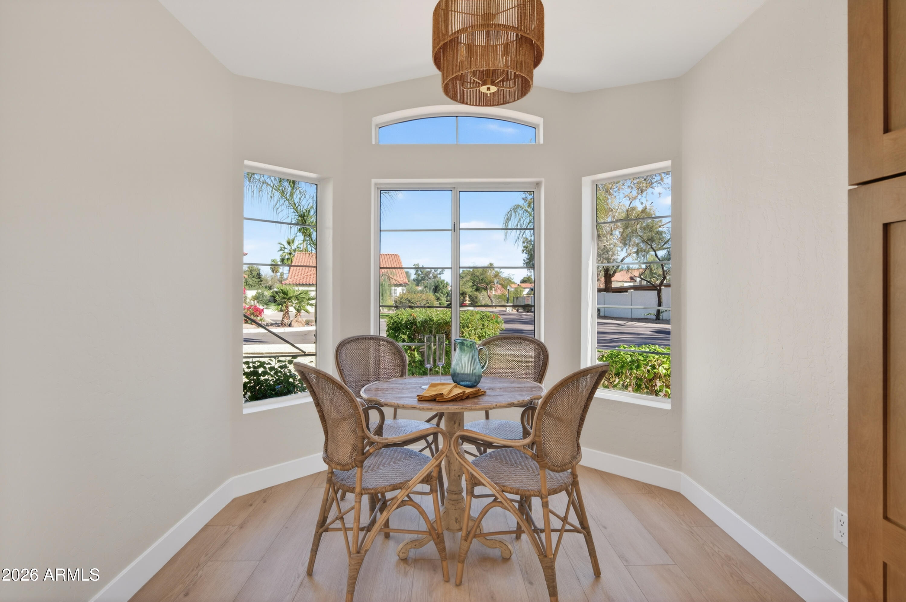 4814 East Monte Way Phoenix, AZ 85044 - Photo 14 of 42 a view of a dining room with furniture window and outside view