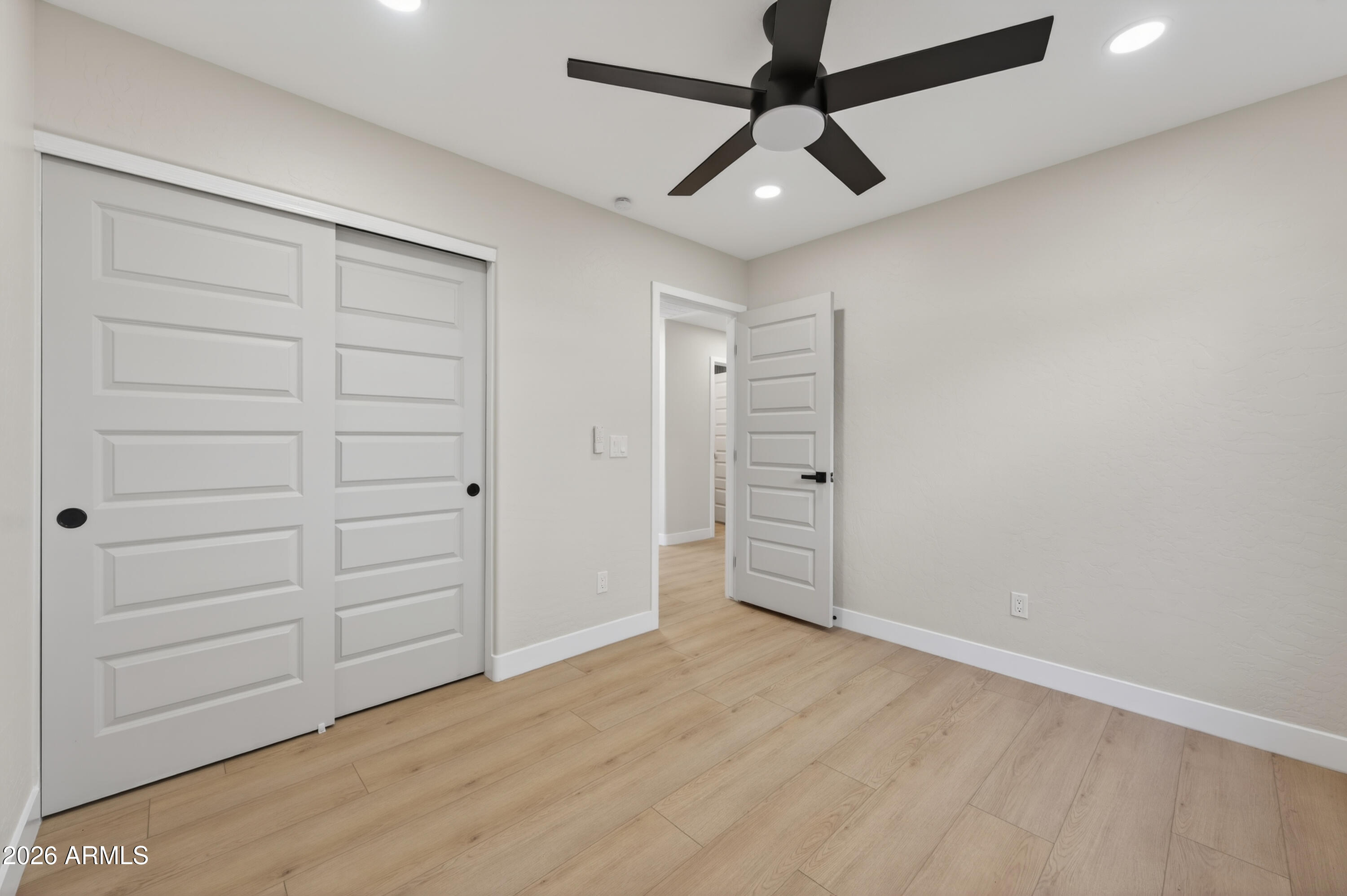 4814 East Monte Way Phoenix, AZ 85044 - Photo 23 of 42 wooden floor in an empty room