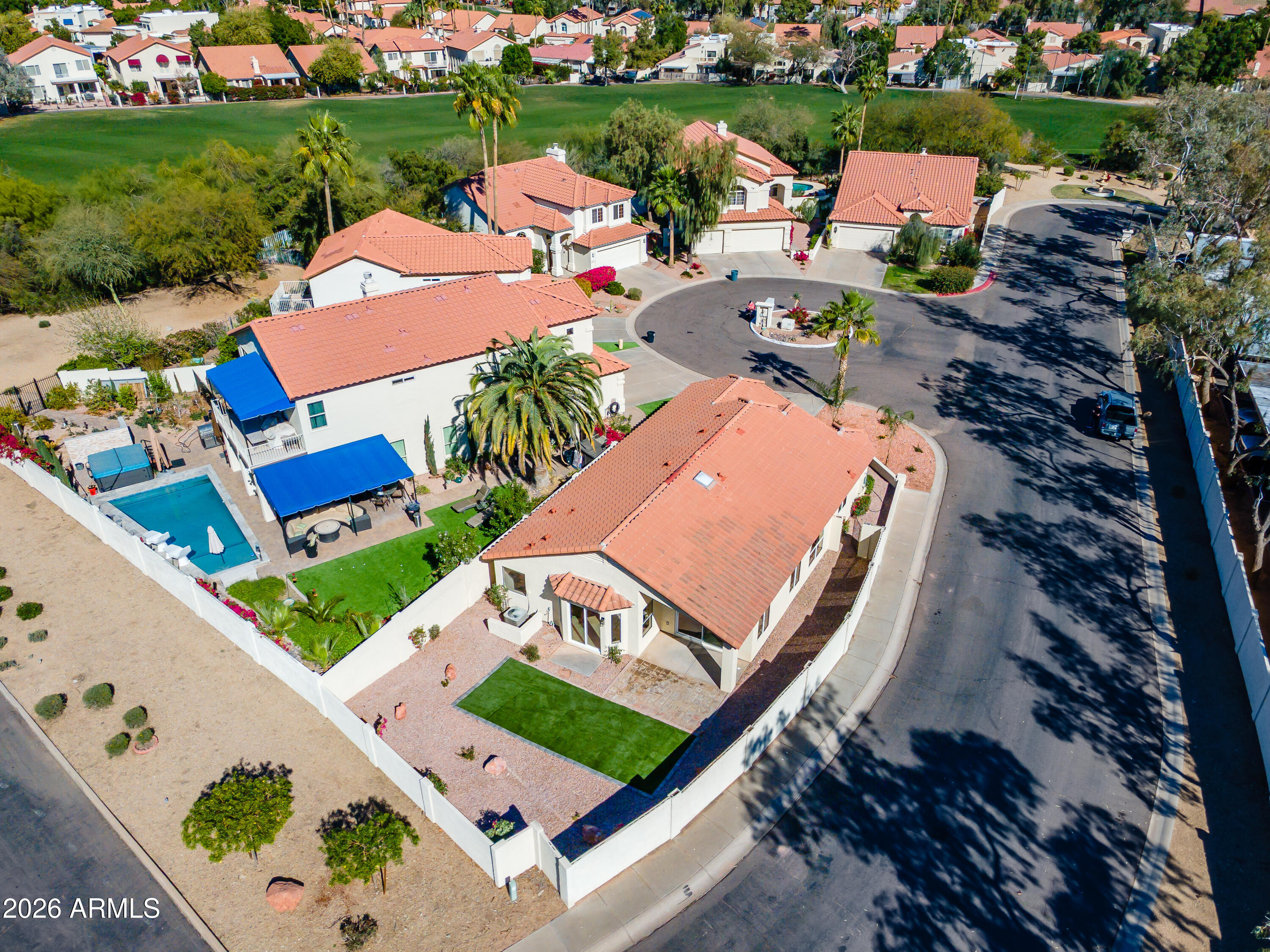 4814 East Monte Way Phoenix, AZ 85044 - Photo 35 of 42 an aerial view of a house with a garden and trees