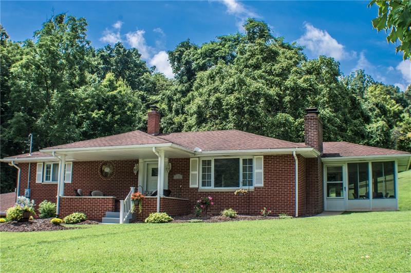 1545 McElree Road Washington, PA 15301 - Photo 1 of 24 Maintenance free brick ranch and 4 seasons room.