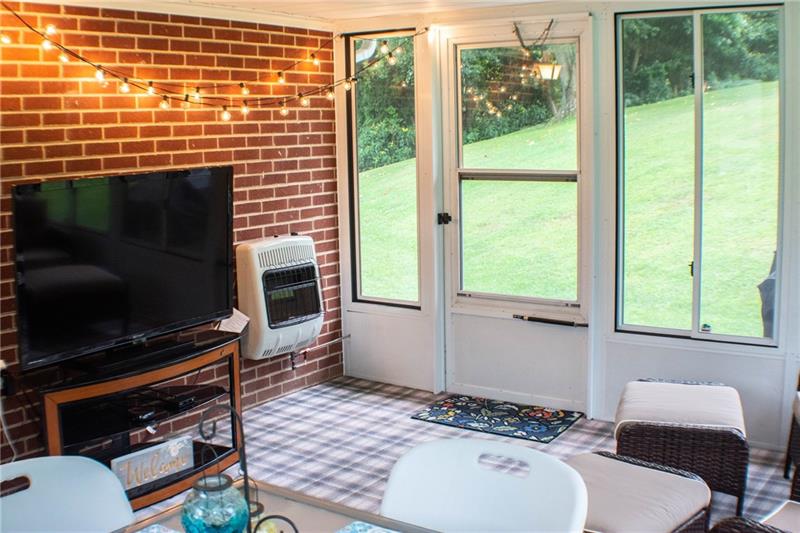 1545 McElree Road Washington, PA 15301 - Photo 8 of 24 4 seasons room with propane gas heater.