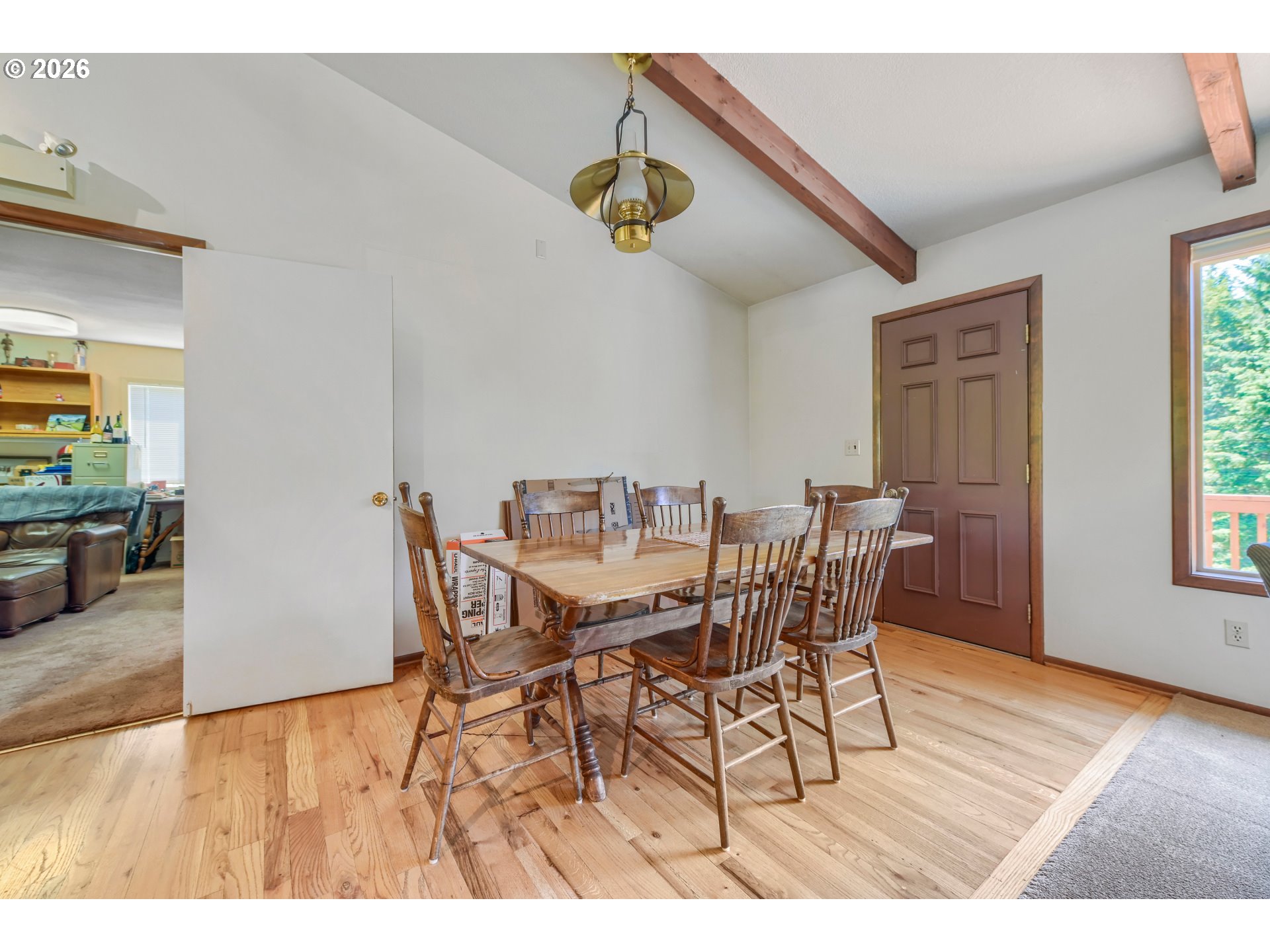 45354 Northwest Hartwick Road Banks, OR 97106 - Photo 10 of 35 a view of a dining room with furniture and wooden floor