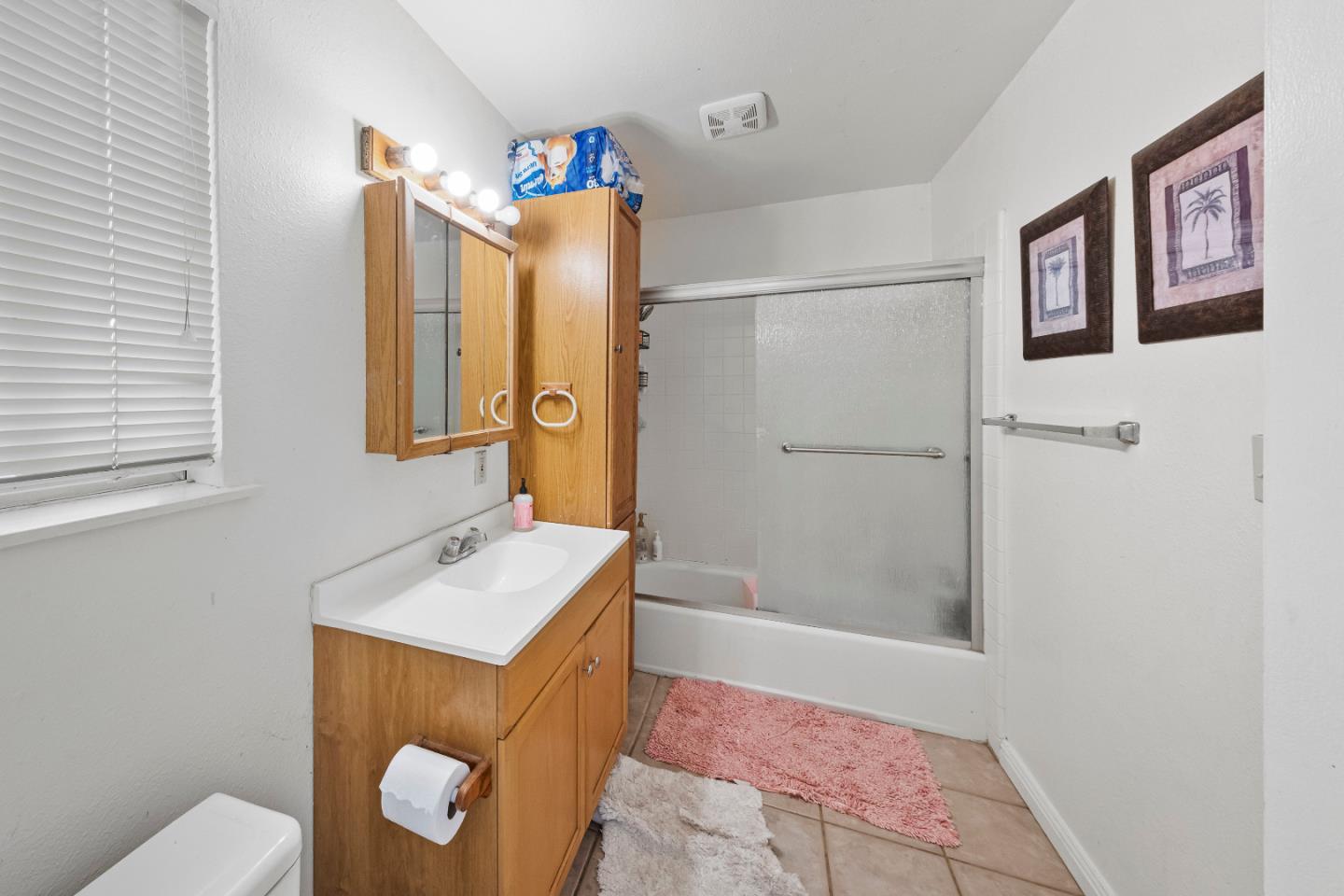 586 Monterey Road Morgan Hill, CA 95037 - Photo 11 of 16 a bathroom with a sink mirror vanity and toilet