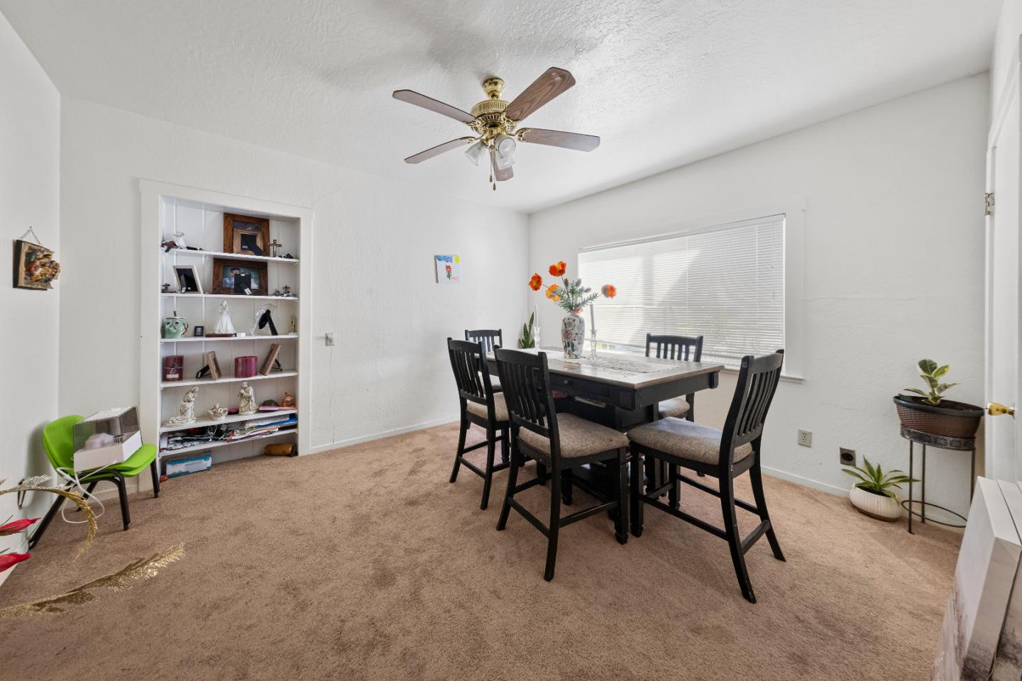 586 Monterey Road Morgan Hill, CA 95037 - Photo 9 of 16 a dining room with furniture and a window