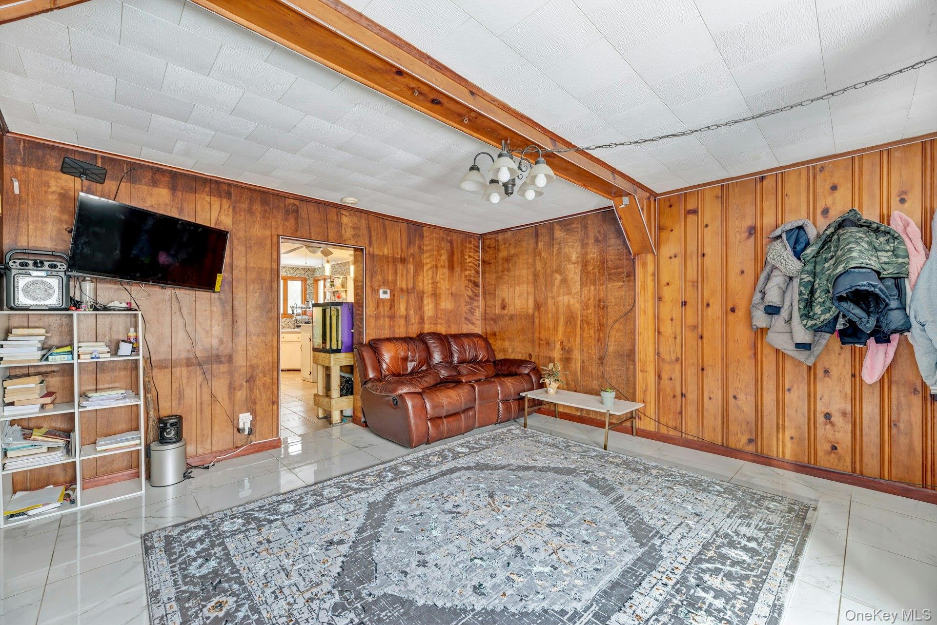 32 Stackyard Drive Mastic Beach, NY 11951 - Photo 11 of 25 a view of a livingroom with furniture and furniture