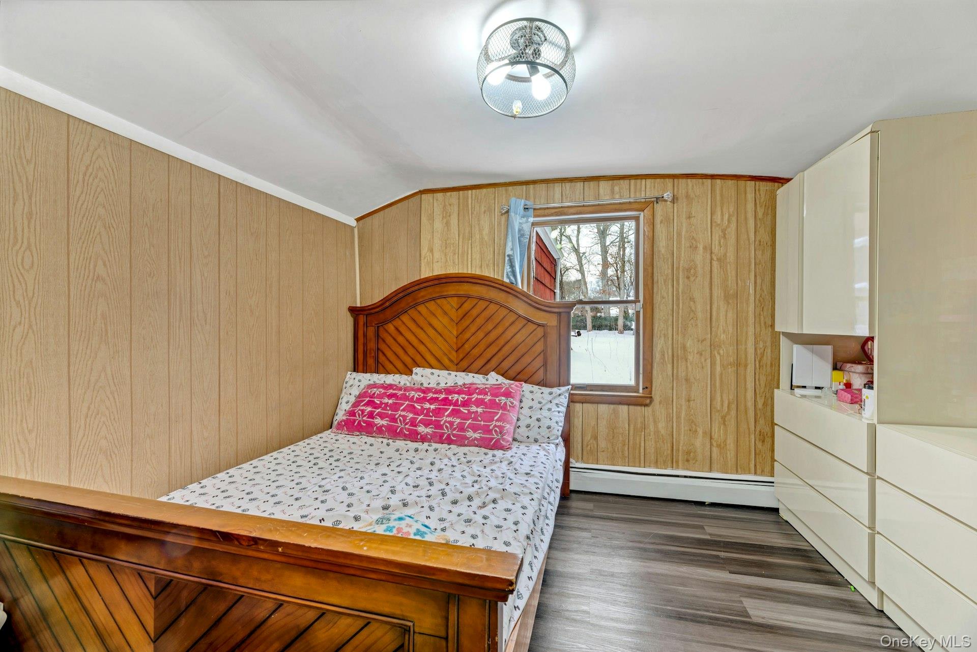 32 Stackyard Drive Mastic Beach, NY 11951 - Photo 17 of 25 a bedroom with a bed and a window