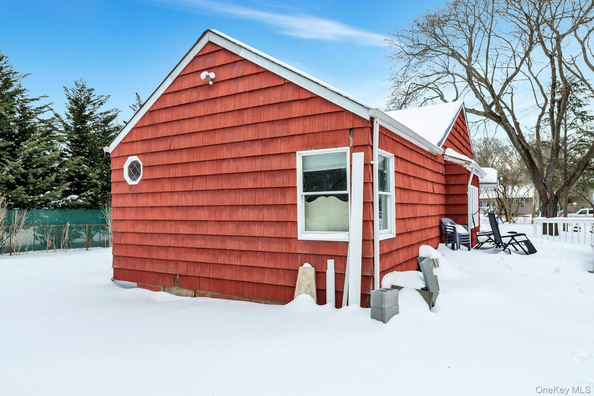 32 Stackyard Drive Mastic Beach, NY 11951 - Photo 21 of 25 a view of backyard of house