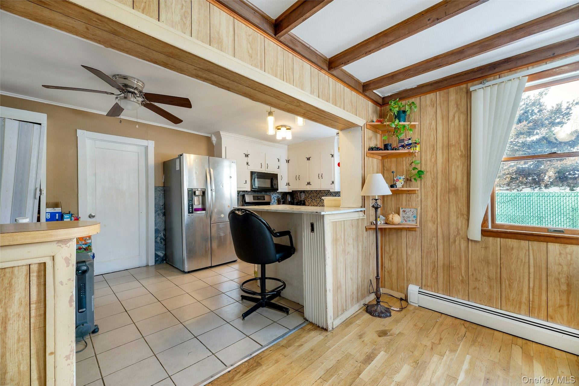 32 Stackyard Drive Mastic Beach, NY 11951 - Photo 7 of 25 a view of kitchen with furniture and a window