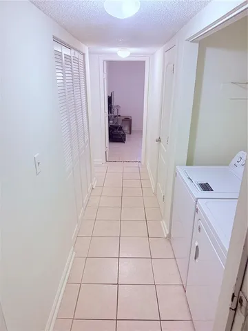 a view of utility room with a window