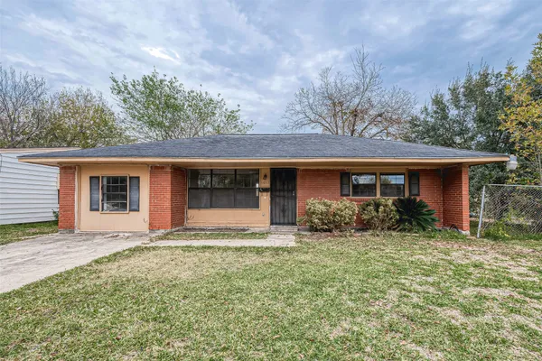 front view of a house with yard