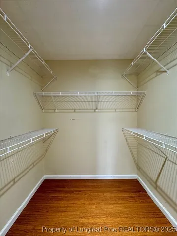 a view of a room with racks on the wall