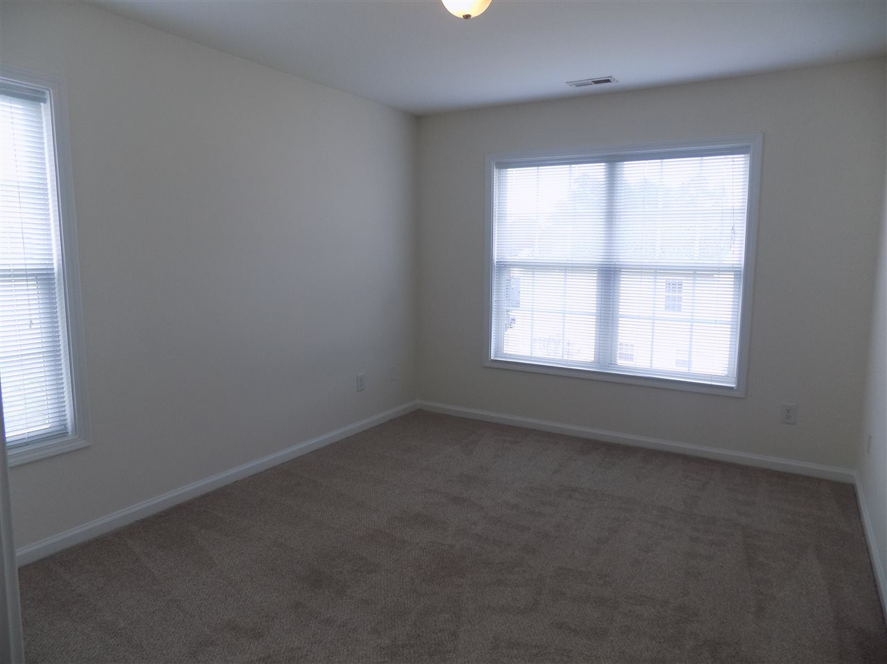 1209 Kinsfolk Circle Raleigh, NC 27610 - Photo 8 of 11 Guest Bedroom