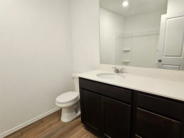 a bathroom with a sink and a toilet