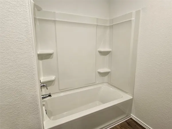 a bathroom with a bathtub
