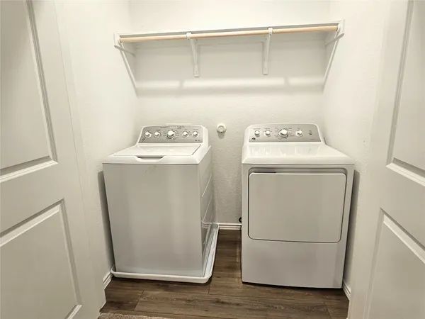 a utility room with dryer and washer