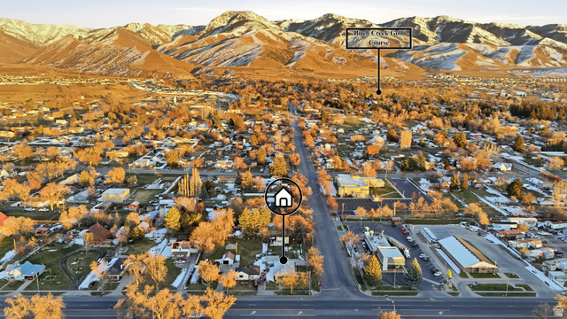 202 Main Street Smithfield, UT 84335 - Photo 32 of 32 Aerial view of property's location with a mountainous background and nearby suburban area