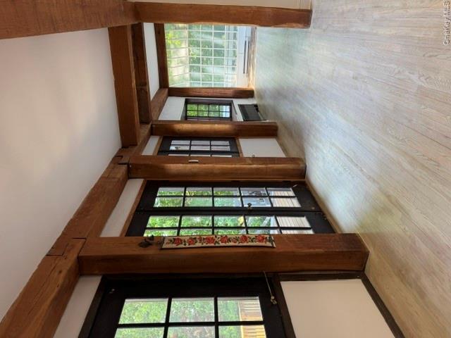 45 Upper Ritie Street Piermont, NY 10968 - Photo 6 of 30 Beamed ceiling passes deck entry to sunroom. All windows face Hudson Rover