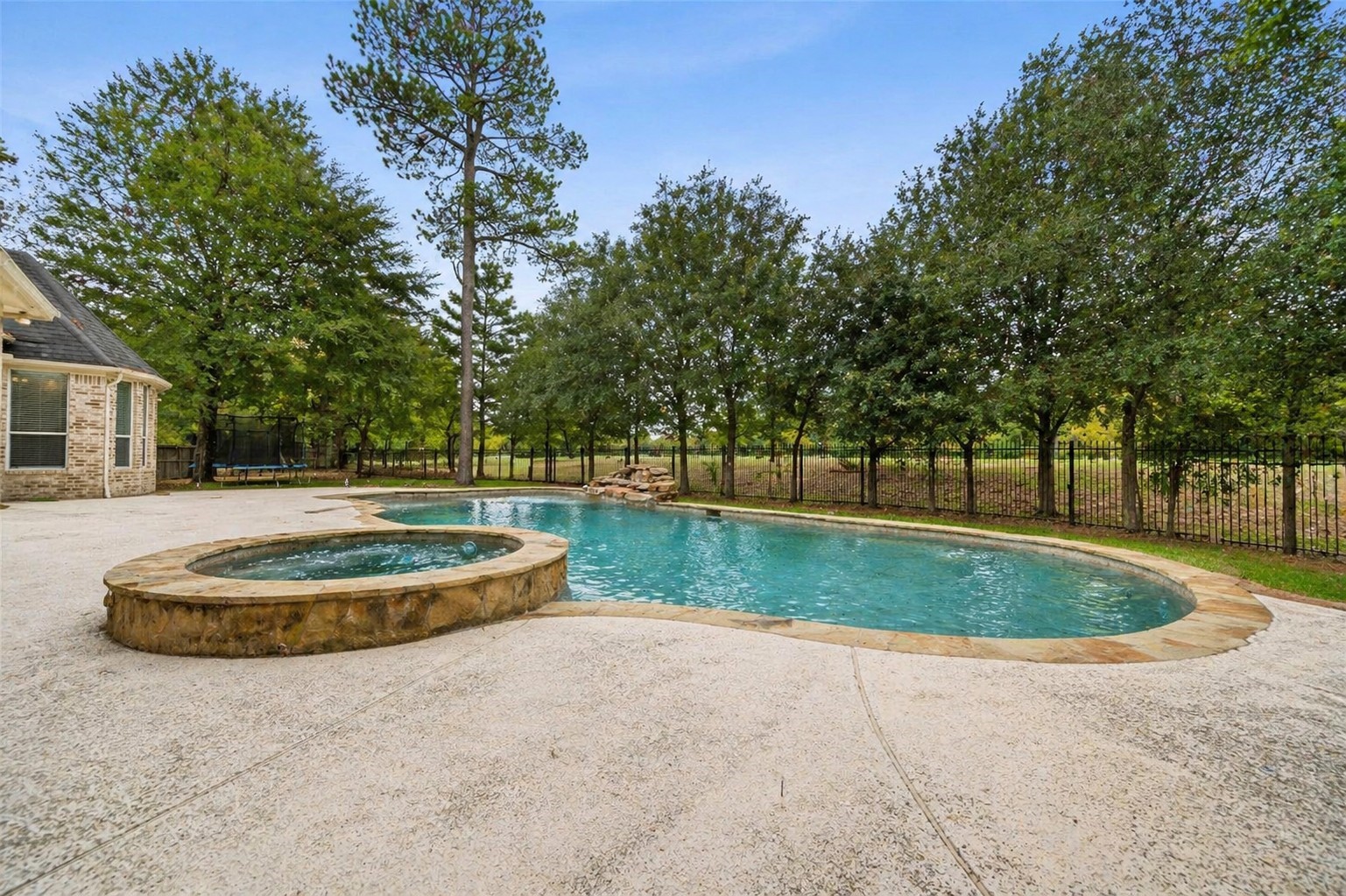 3 Etude Court Spring, TX 77382 - Photo 43 of 45 a backyard of house with outdoor seating and green space