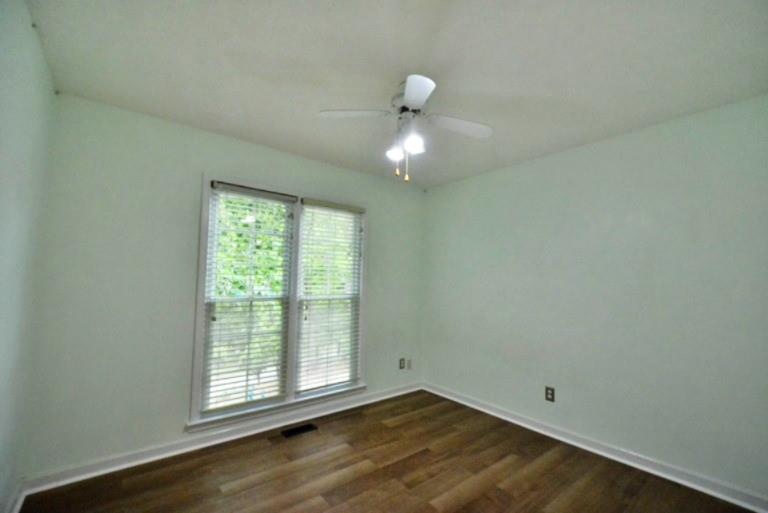114 Due W Street Dallas, GA 30157 - Photo 13 of 32 an empty room with wooden floor and windows