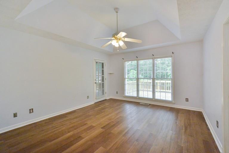 114 Due W Street Dallas, GA 30157 - Photo 16 of 32 wooden floor in an empty room with a window