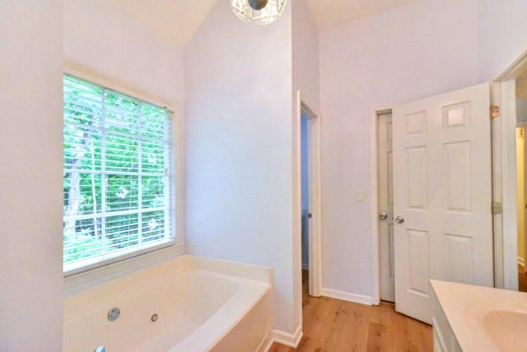 114 Due W Street Dallas, GA 30157 - Photo 19 of 32 a bathroom with a tub and shower