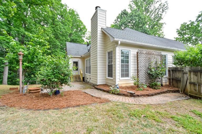 114 Due W Street Dallas, GA 30157 - Photo 25 of 32 a backyard of a house with table and chairs