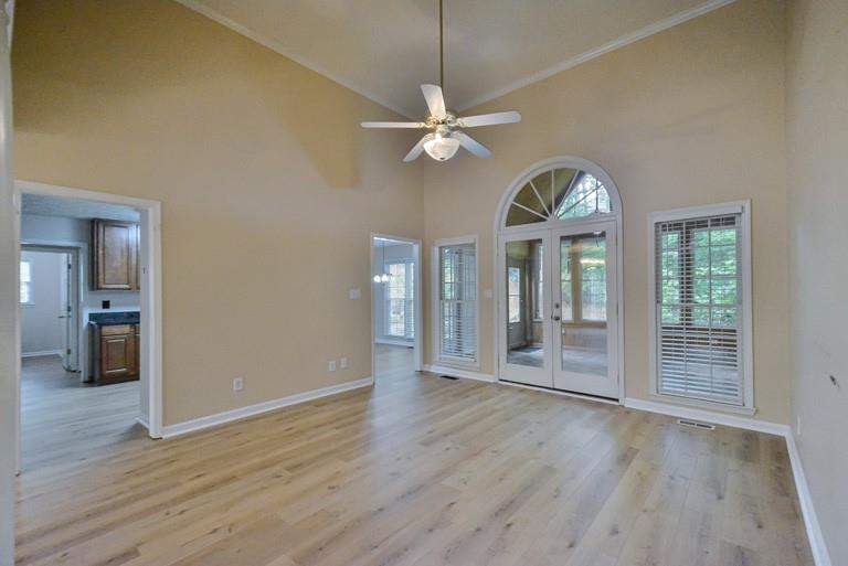 114 Due W Street Dallas, GA 30157 - Photo 4 of 32 wooden floor in an empty room with a window