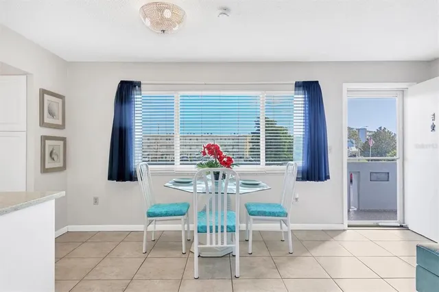 a view of a livingroom with furniture and window