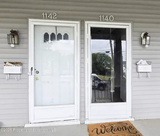 a bathroom with a toilet and a sink