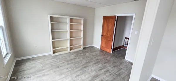 a kitchen with a cabinets and appliances