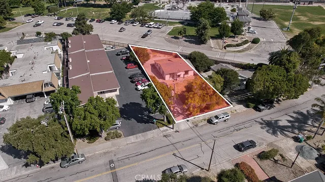an aerial view of a house with outdoor space