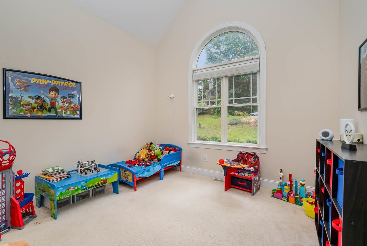 1309 Taylor Farm Road Raleigh, NC 27603 - Photo 18 of 38 Secondary bedroom at the front of the first floor. Palladian window for lots of light Bedroom