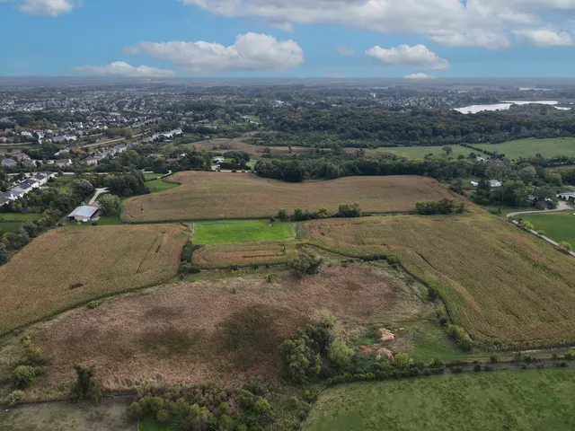 an aerial view of a houses with outdoor space