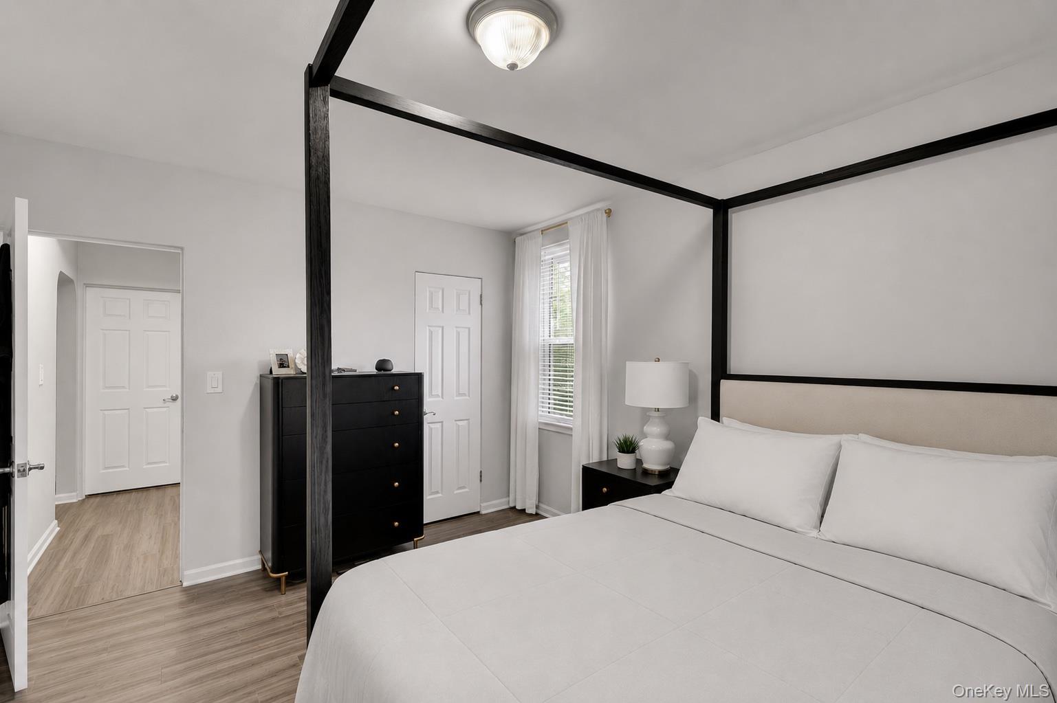 765 Bronx River Road, Unit 4A Bronxville, NY 10708 - Photo 11 of 15 A calming primary bedroom offering comfort and modern elegance.